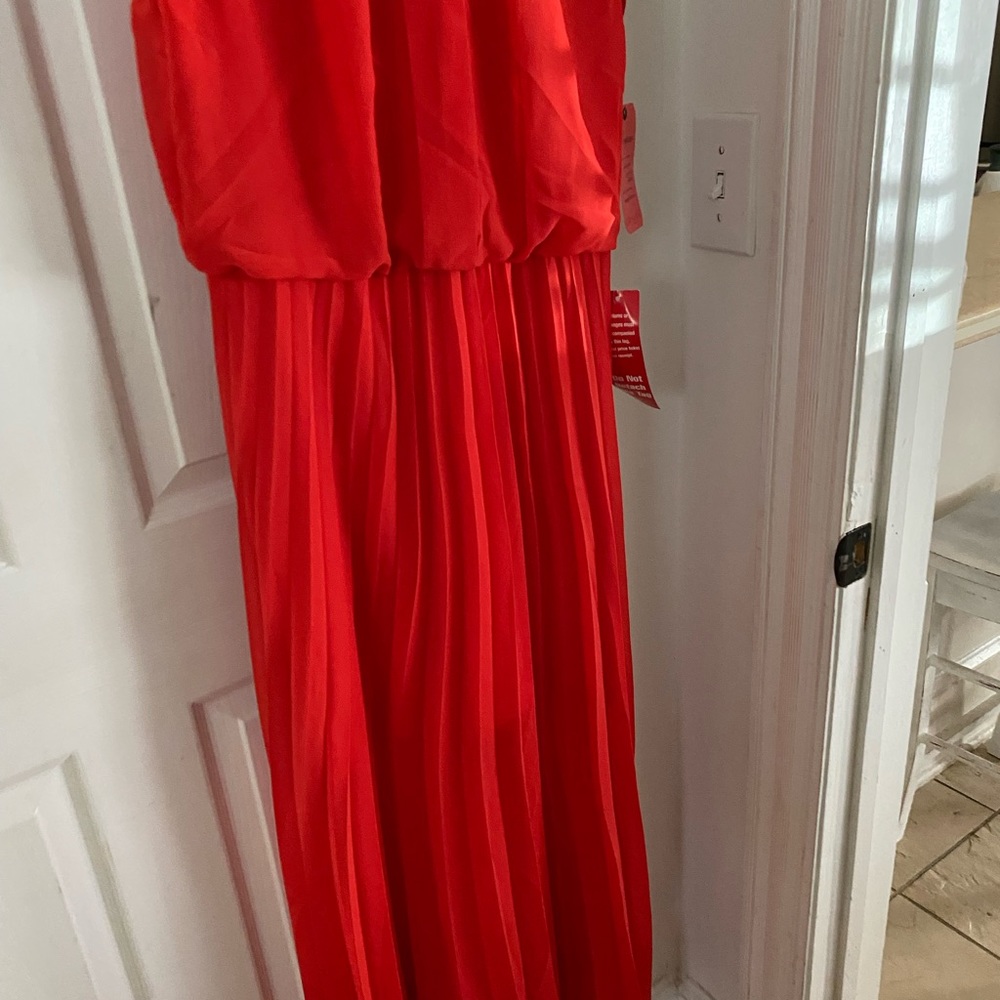 Hermoso vestido de plises para tu fiesta